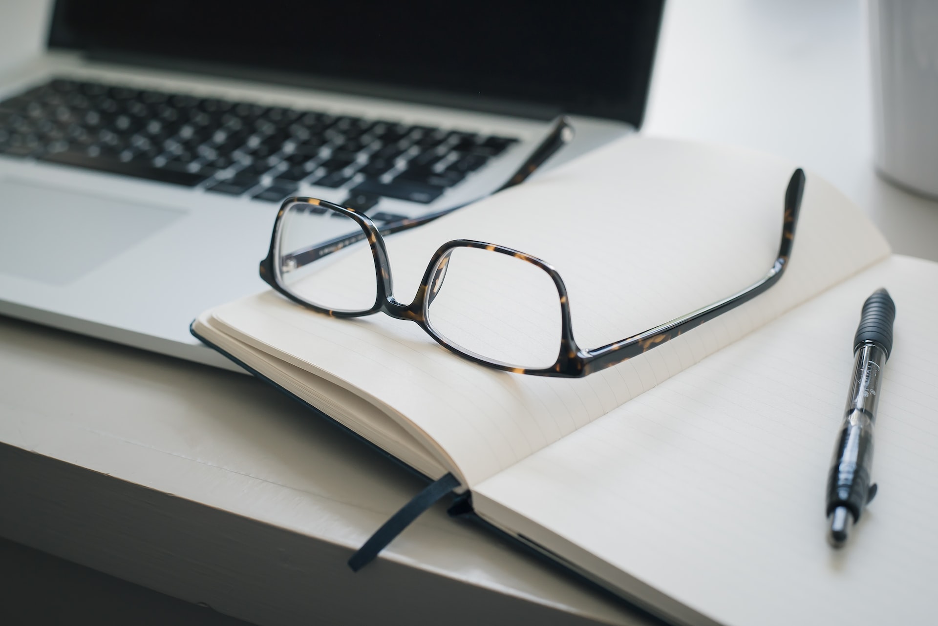 Cloud consultant glasses and notepad