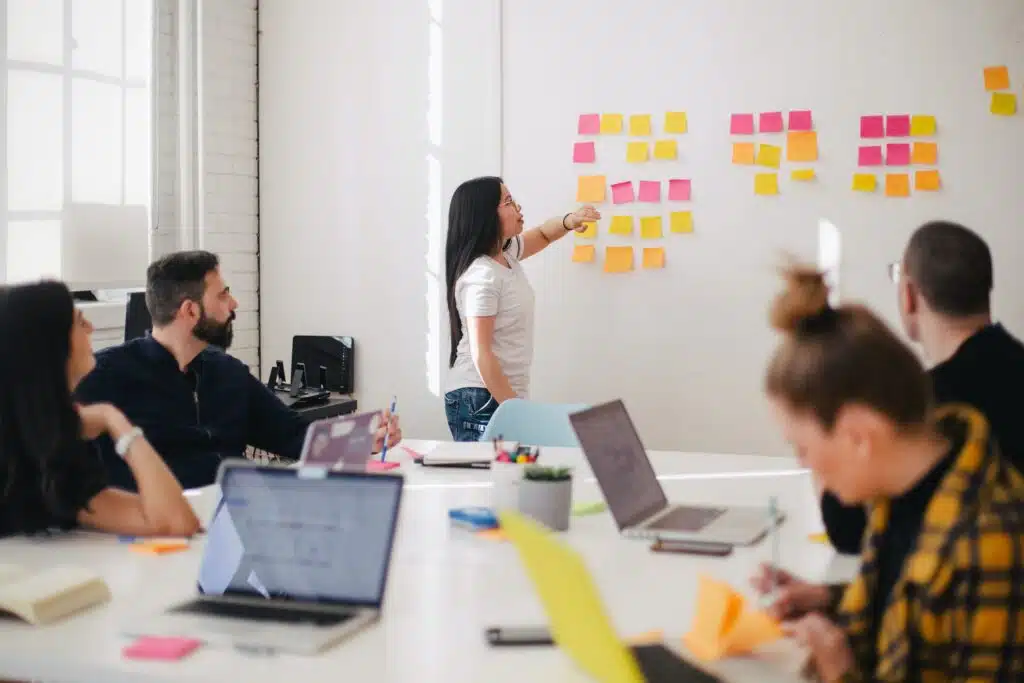 devops experts training devops staff on whiteboard